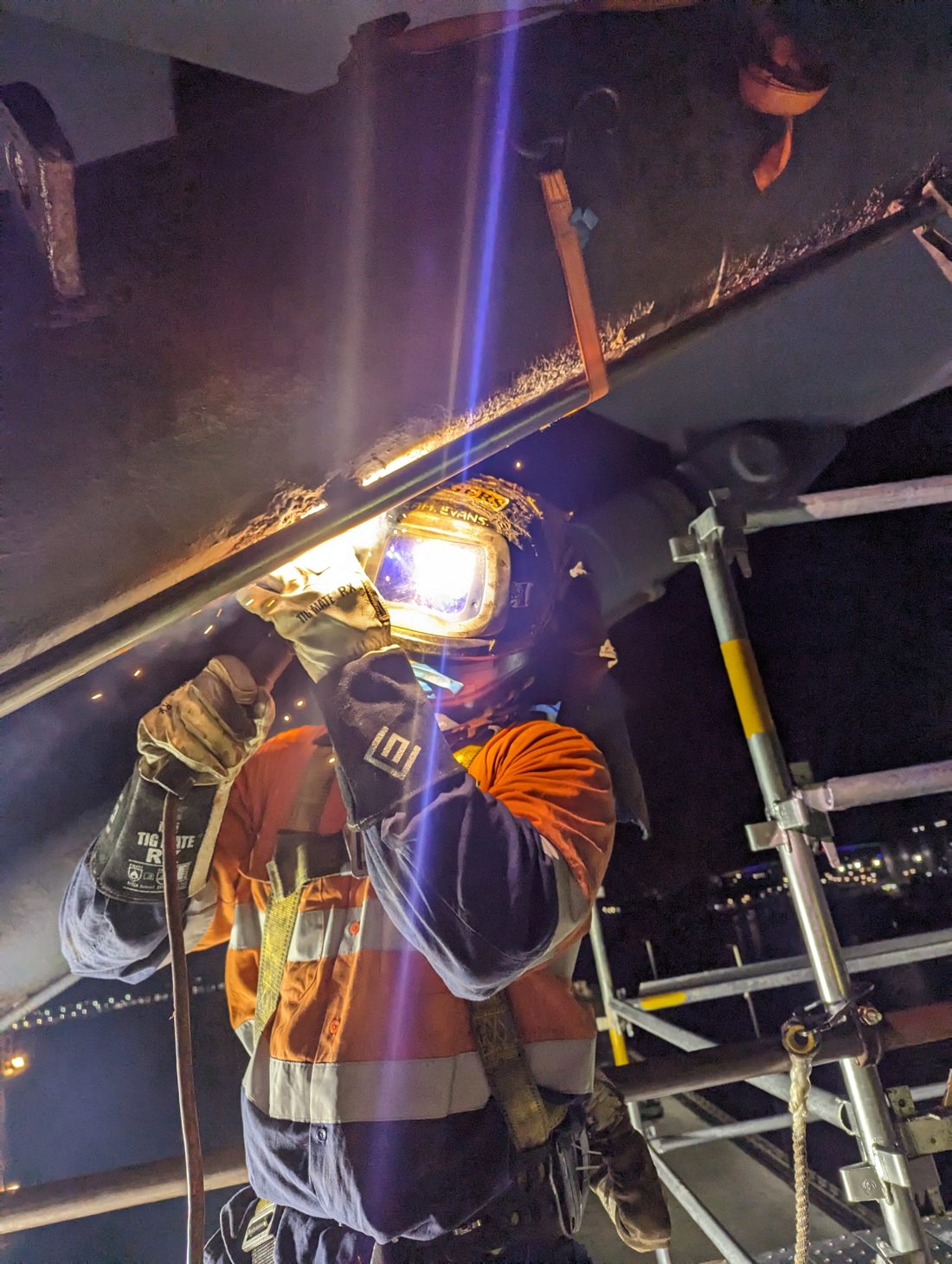 Overhead coded welding at height on a shutdown