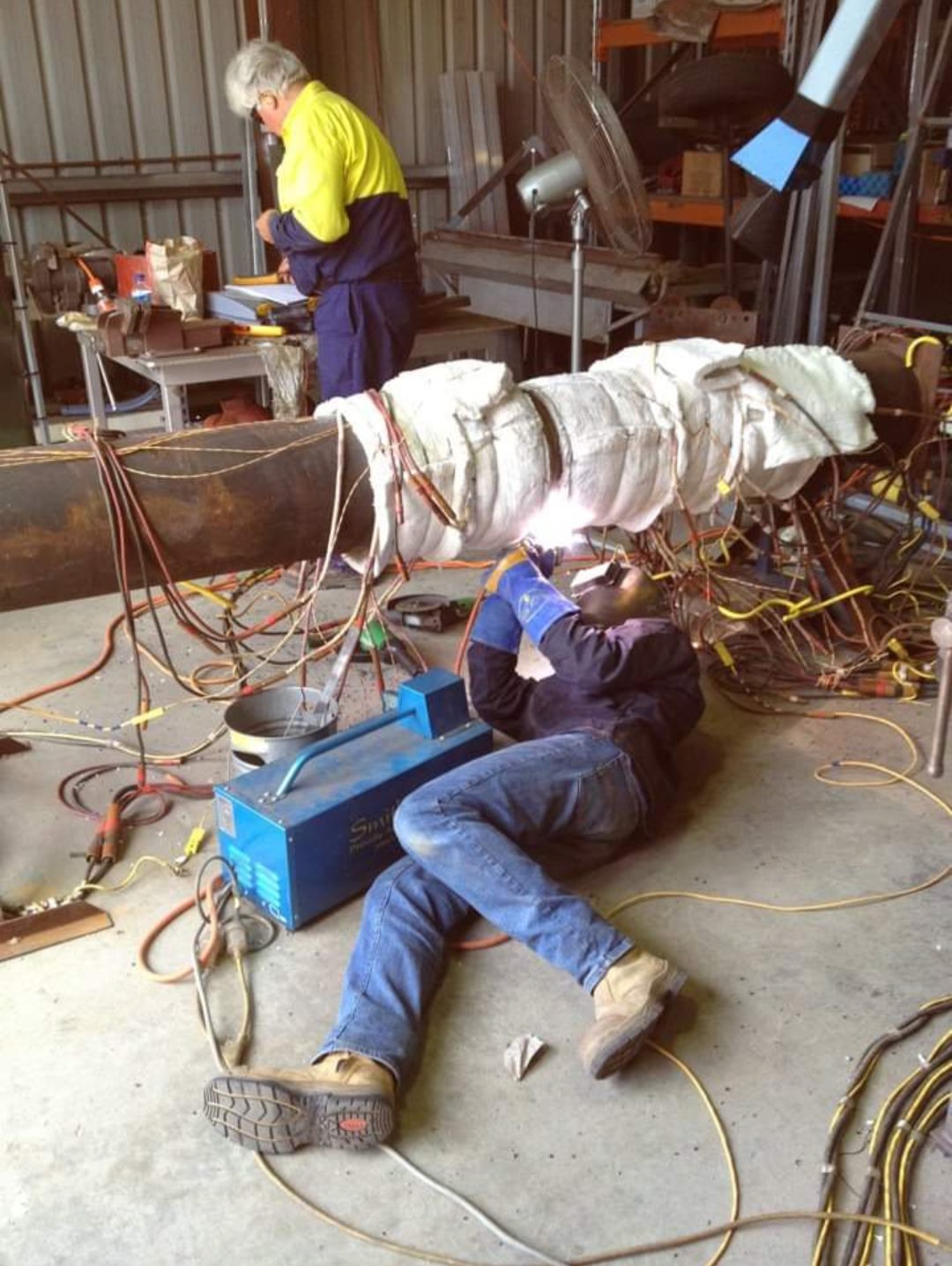 Pipe weld with preheat control to a qualified procedure