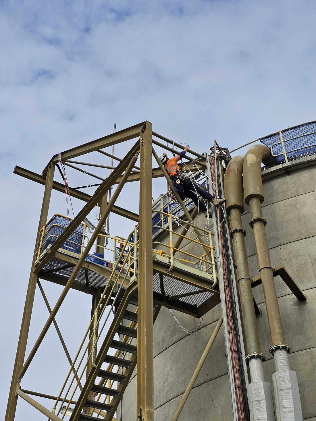 Rope access work at height on a steel structure